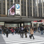 Passengers outside Penn Station New York. Penn Station at Madison Garden Square Manhattan New York
