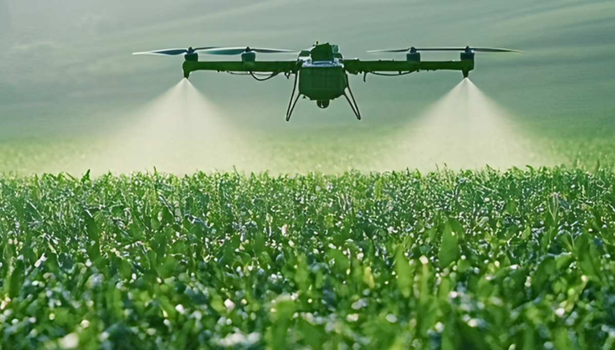 Agricultural drone spraying a green field with mist from its nozzles at ground level
